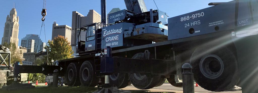 Eastland Crane 120 ton crane setting a cooling tower at COSI in downtown Columbus.